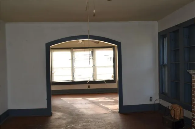 an empty room with an empty space and a window