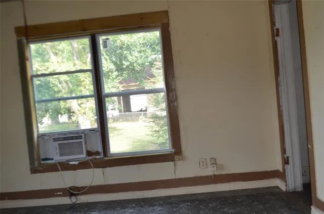 a view of a room that has a window in it