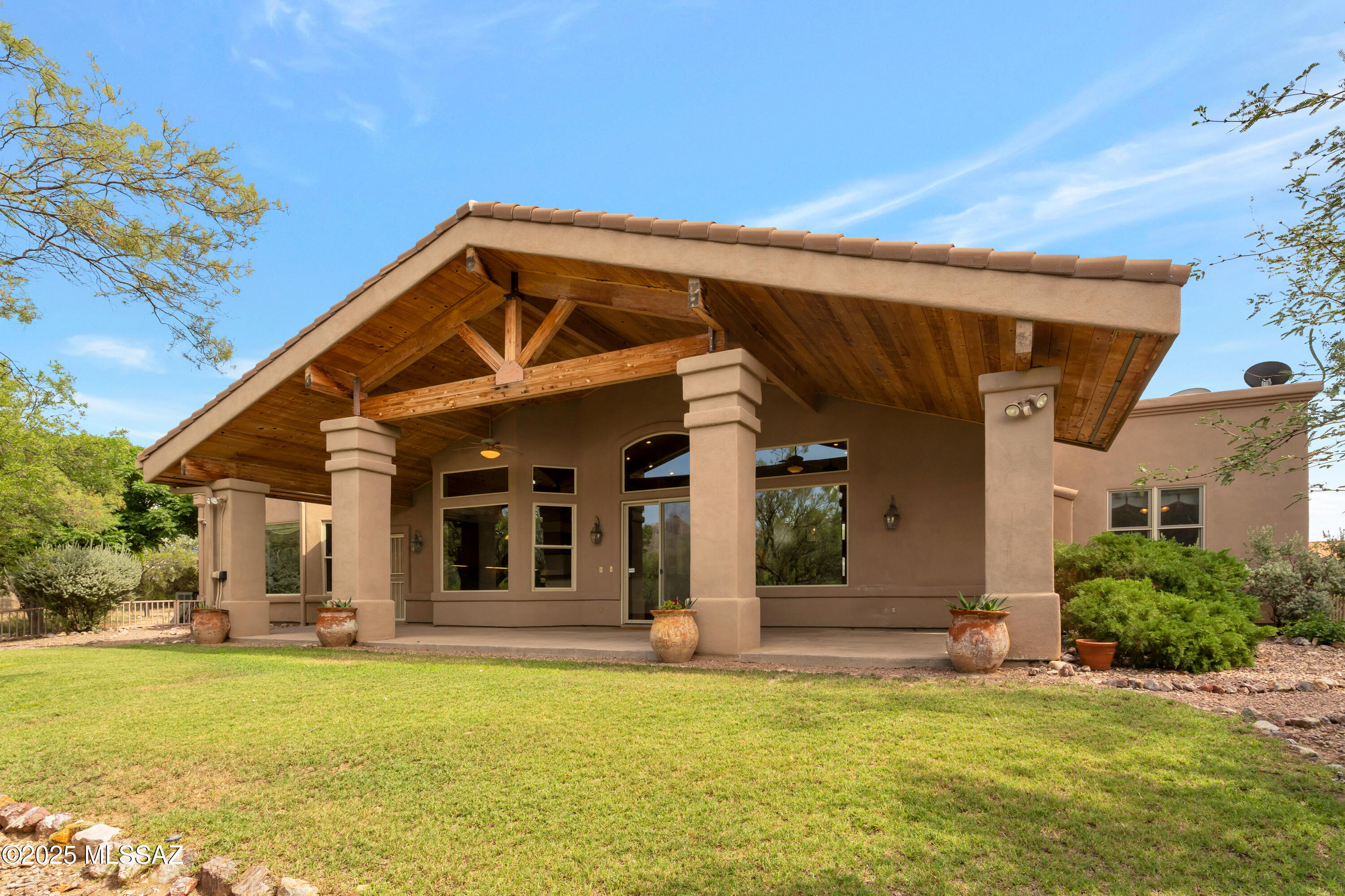 4001 North Harrison Road Tucson, AZ 85749 - Photo 45 of 50 a view of a house with a swimming pool