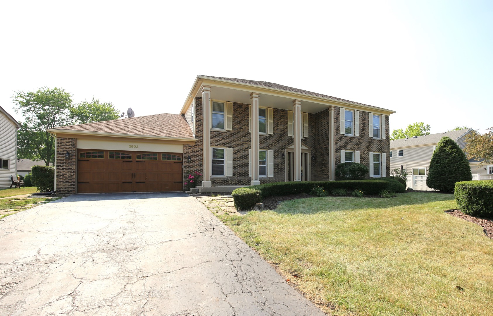 2603 Old Mill Lane Rolling Meadows, IL 60008 - Photo 2 of 45 a front view of a house with a yard