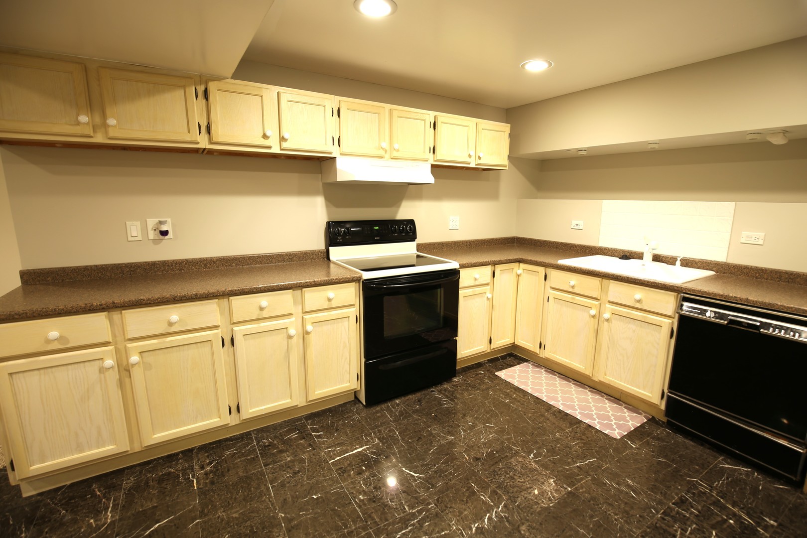 2603 Old Mill Lane Rolling Meadows, IL 60008 - Photo 37 of 45 a kitchen with granite countertop cabinets stainless steel appliances and a sink