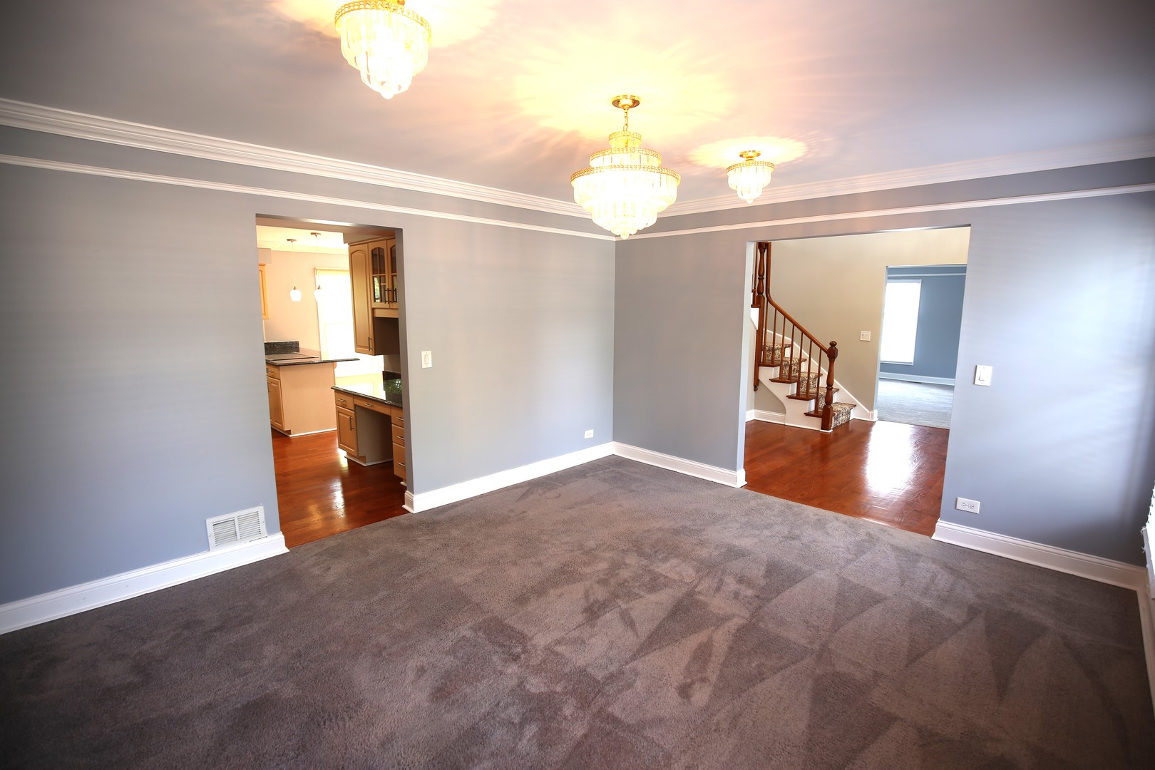 2603 Old Mill Lane Rolling Meadows, IL 60008 - Photo 7 of 45 a view of a kitchen with a sink cabinet and a living room view