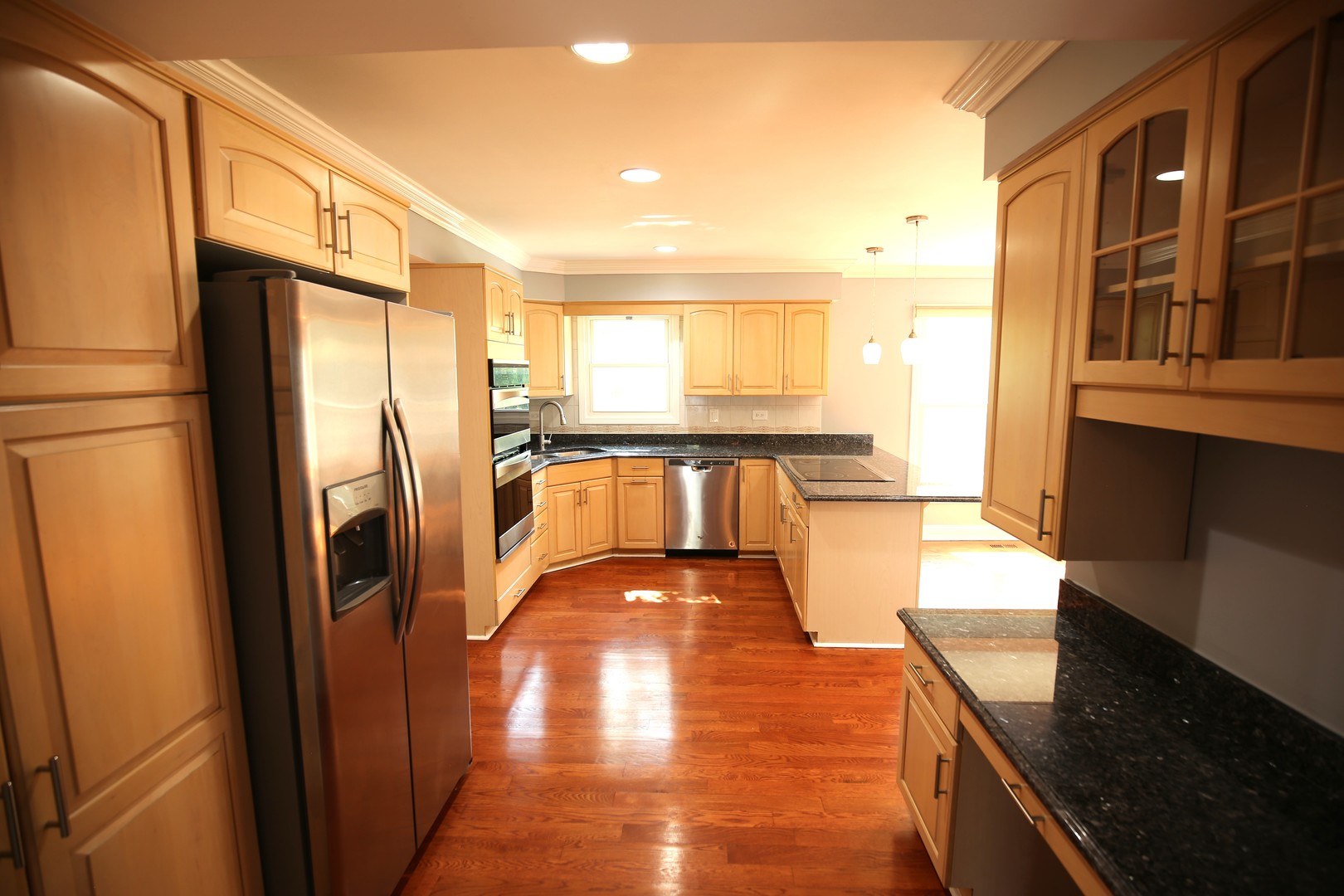 2603 Old Mill Lane Rolling Meadows, IL 60008 - Photo 9 of 45 a view of a kitchen with stainless steel appliances granite countertop a refrigerator and a stove