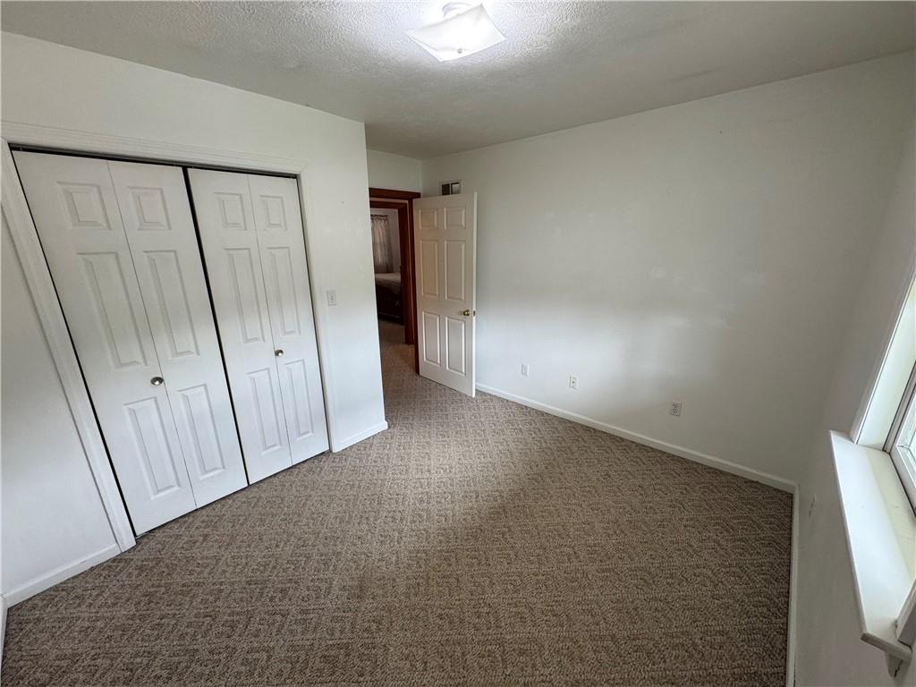 208 Pats Drive Rostraver Township, PA 15012 - Photo 14 of 50 a view of an empty room