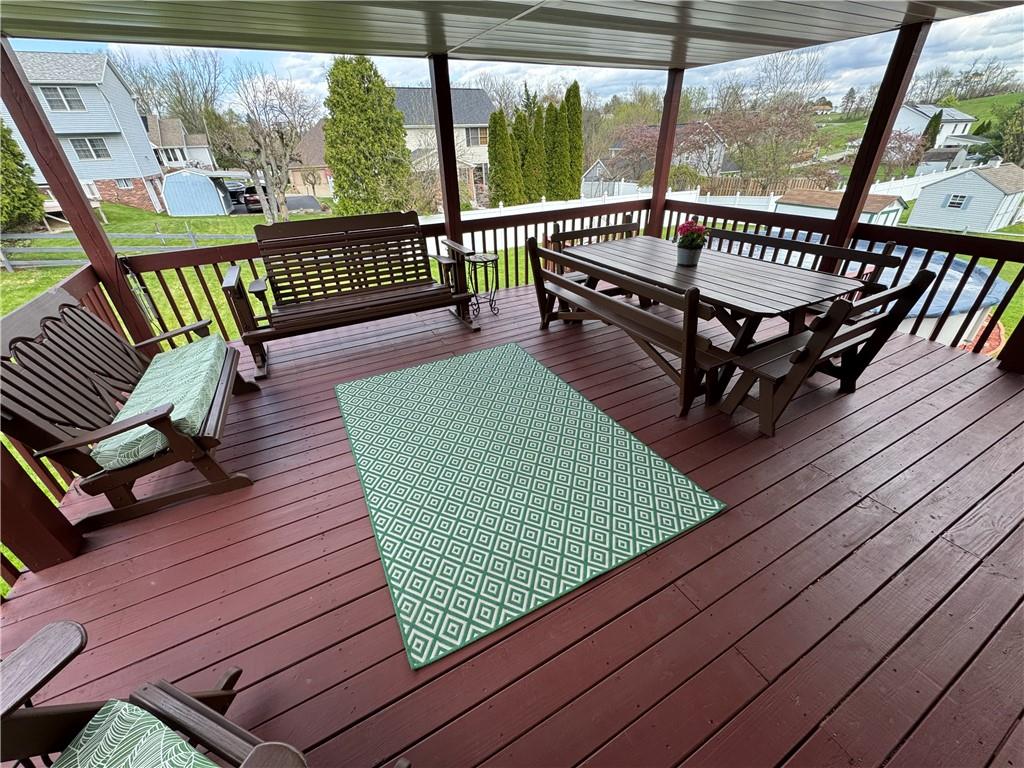 208 Pats Drive Rostraver Township, PA 15012 - Photo 20 of 50 a view of a deck with wooden floor outdoor seating