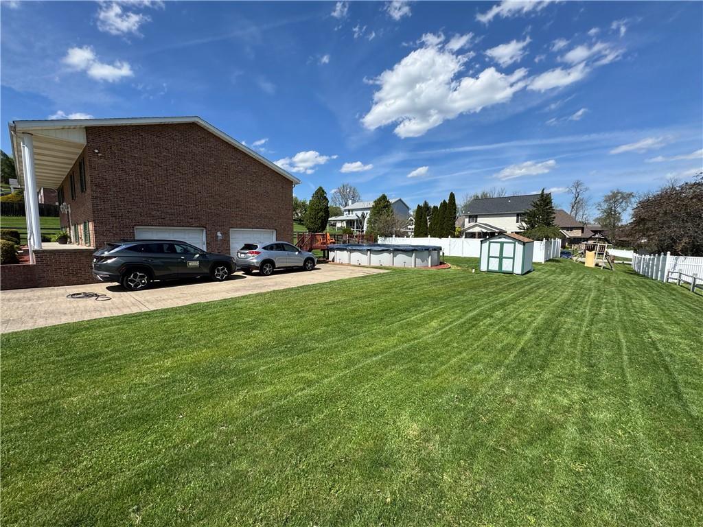 208 Pats Drive Rostraver Township, PA 15012 - Photo 23 of 50 a view of a house with a yard porch and sitting area
