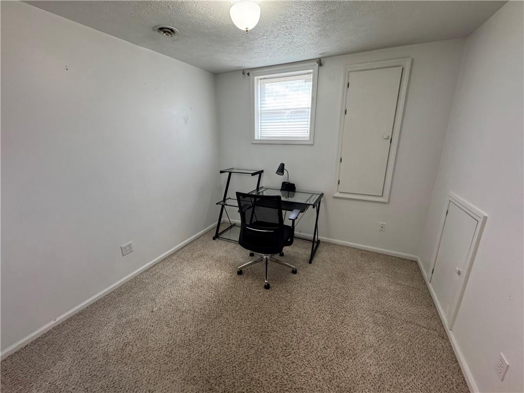 208 Pats Drive Rostraver Township, PA 15012 - Photo 28 of 50 a living room with furniture and a window