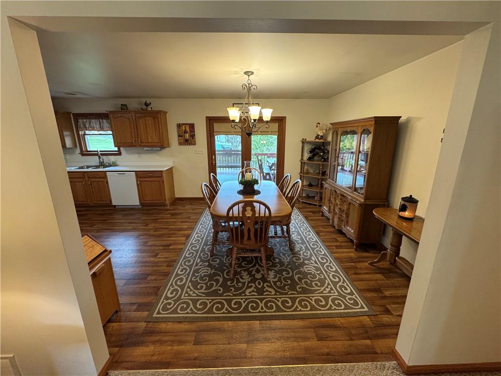 208 Pats Drive Rostraver Township, PA 15012 - Photo 3 of 50 a living room with furniture and a chandelier