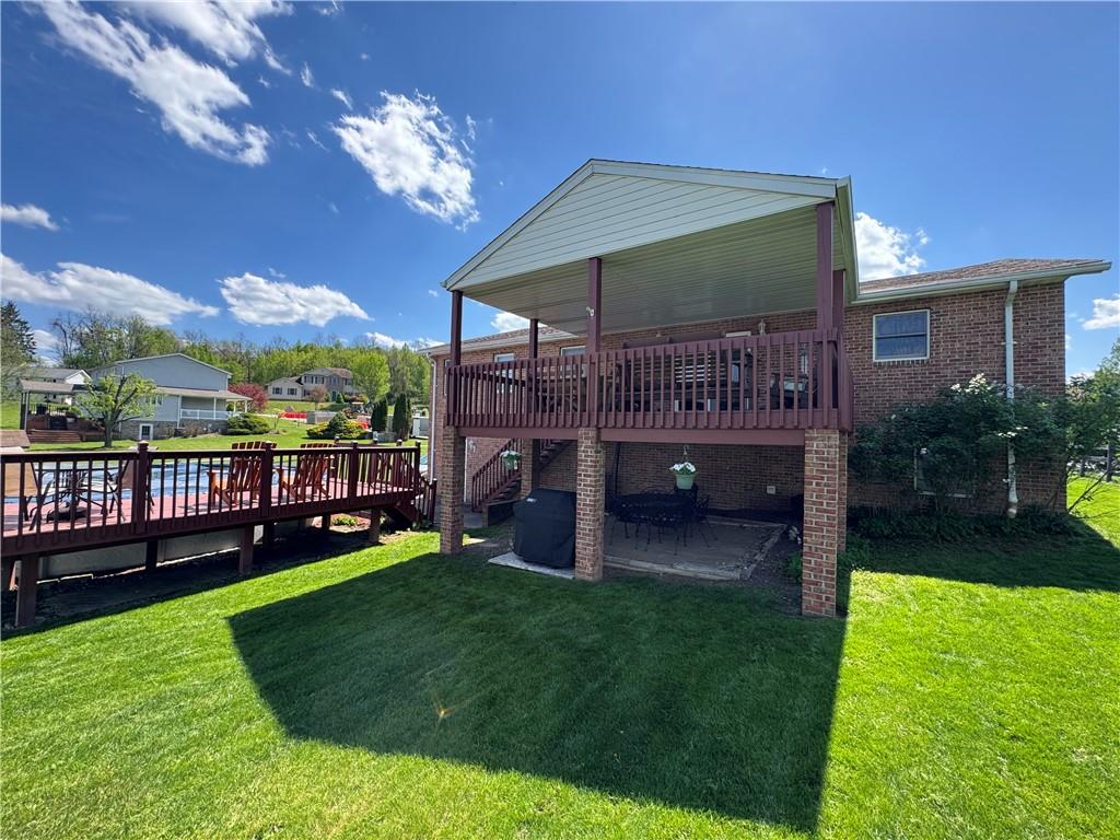 208 Pats Drive Rostraver Township, PA 15012 - Photo 39 of 50 a view of a house with a backyard porch and sitting area