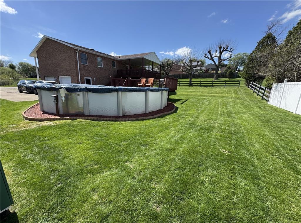 208 Pats Drive Rostraver Township, PA 15012 - Photo 45 of 50 a view of a backyard with swimming pool