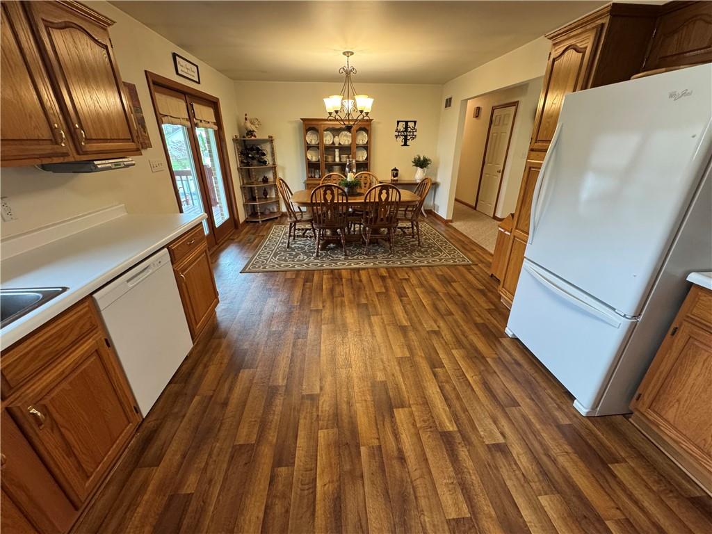 208 Pats Drive Rostraver Township, PA 15012 - Photo 5 of 50 a view of a dining room with furniture window and wooden floor