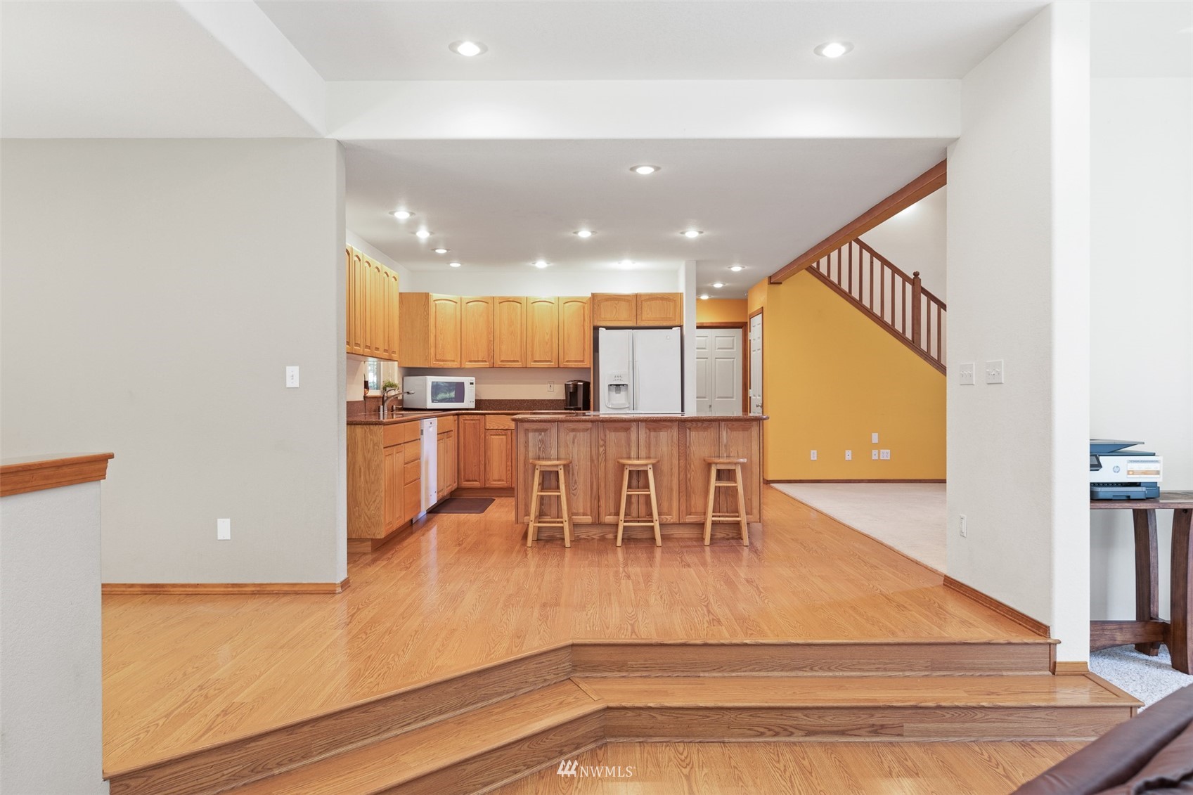 257 Riverside Road Sequim, WA 98382 - Photo 11 of 40 a view of kitchen with kitchen island dining table and chairs