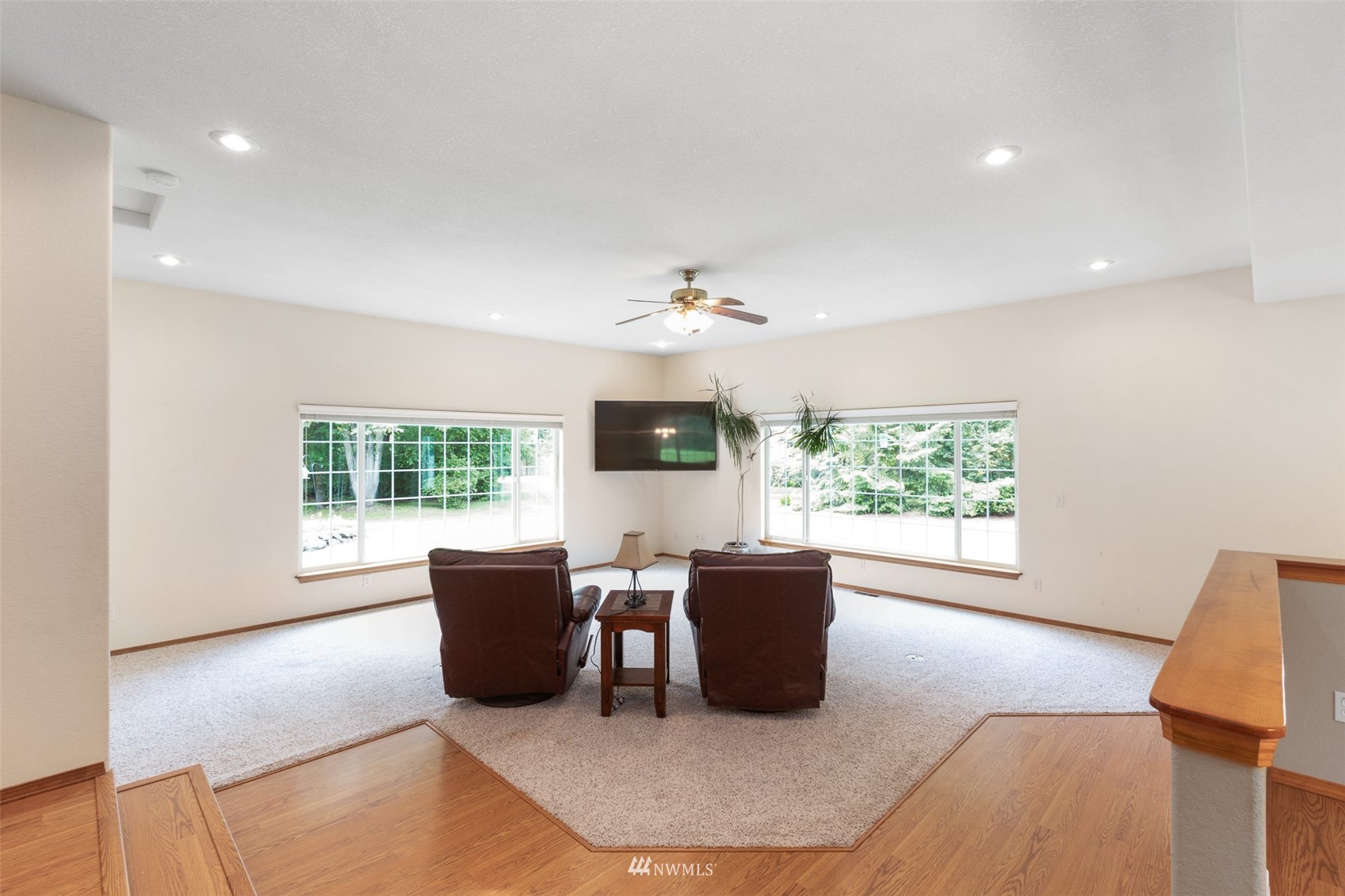 257 Riverside Road Sequim, WA 98382 - Photo 13 of 40 a living room with furniture a flat screen tv and a large window