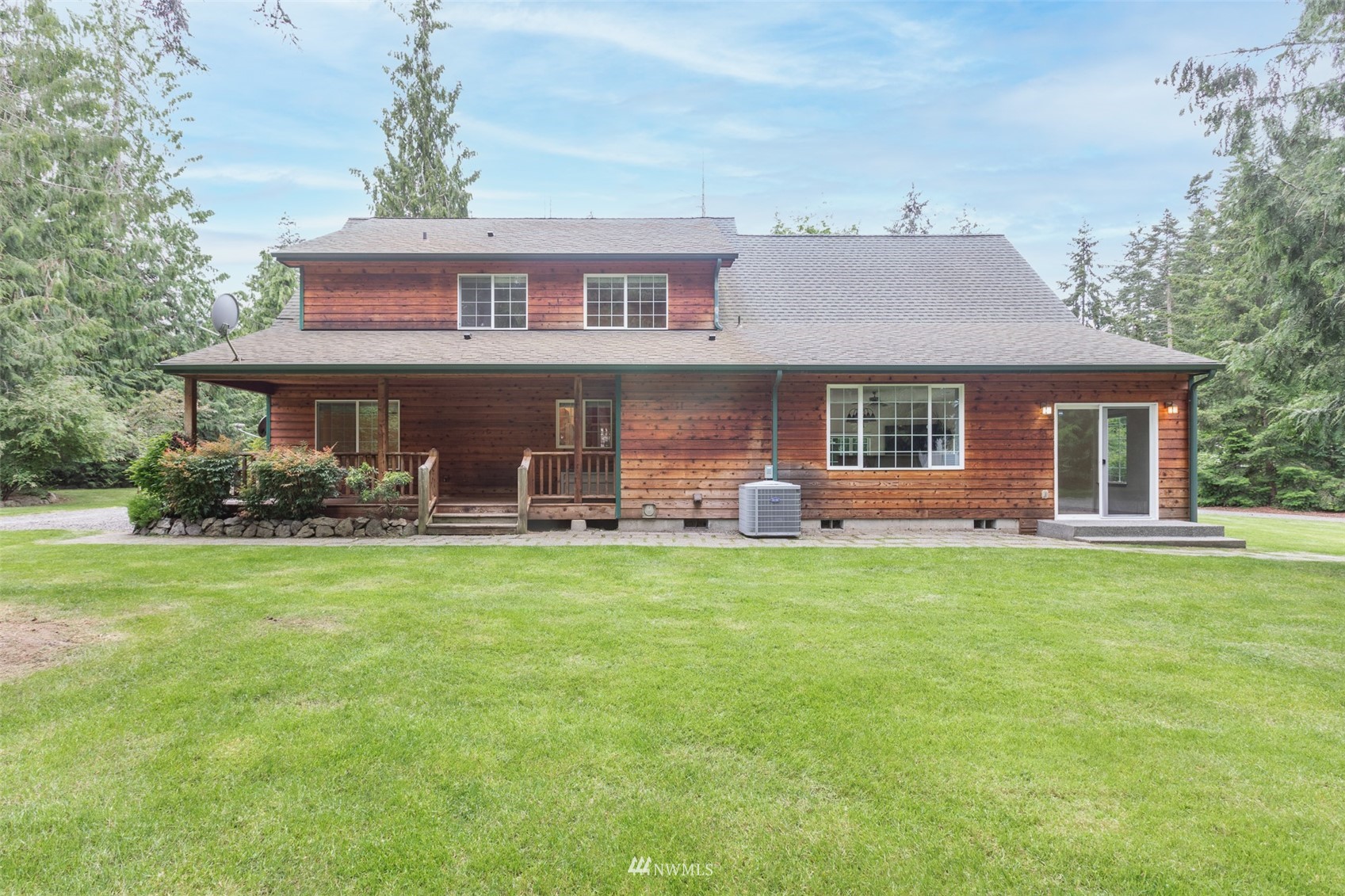 257 Riverside Road Sequim, WA 98382 - Photo 36 of 40 a front view of house with yard barbeque and outdoor seating
