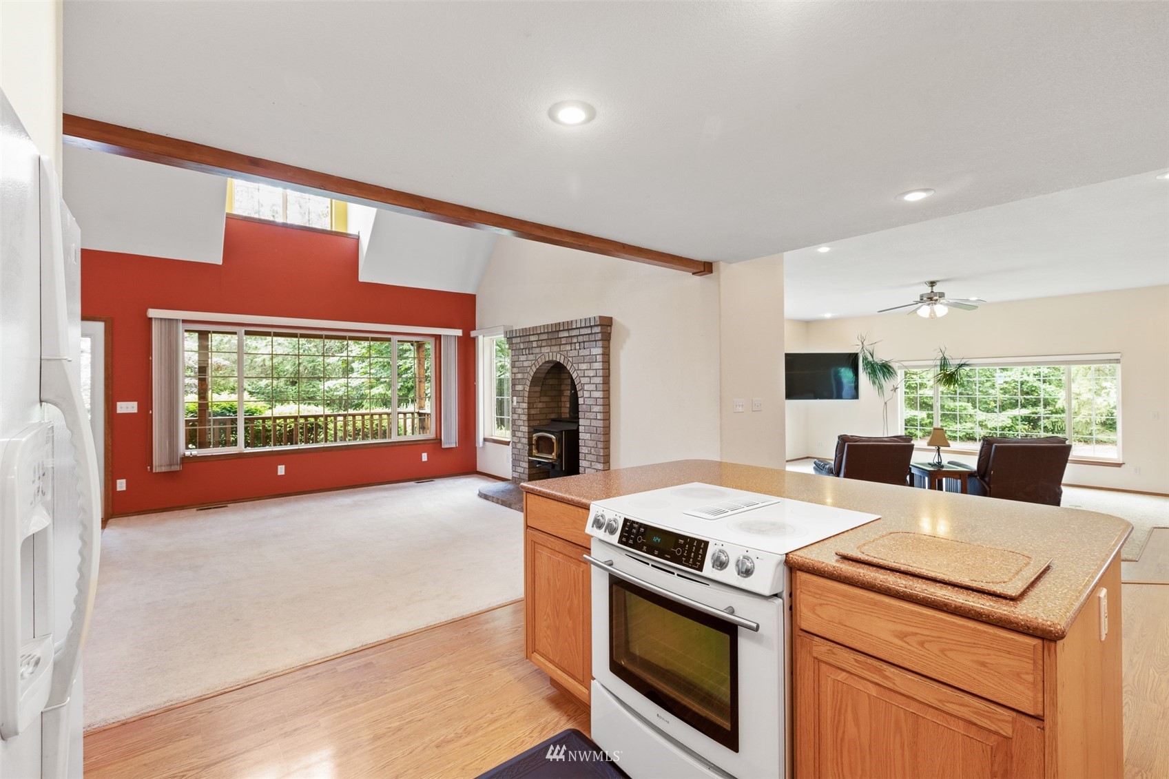 257 Riverside Road Sequim, WA 98382 - Photo 9 of 40 a kitchen that has a stove and a microwave