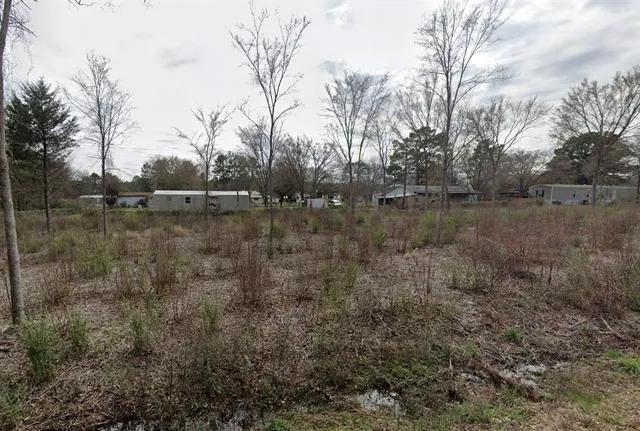 a view of a lake view with forest