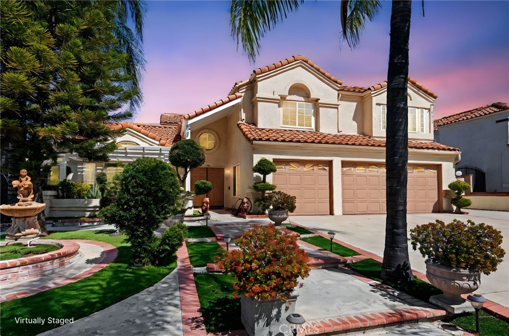 3047 Prado Lane Colton, CA 92324 - Photo 2 of 51 a front view of a house with a garden