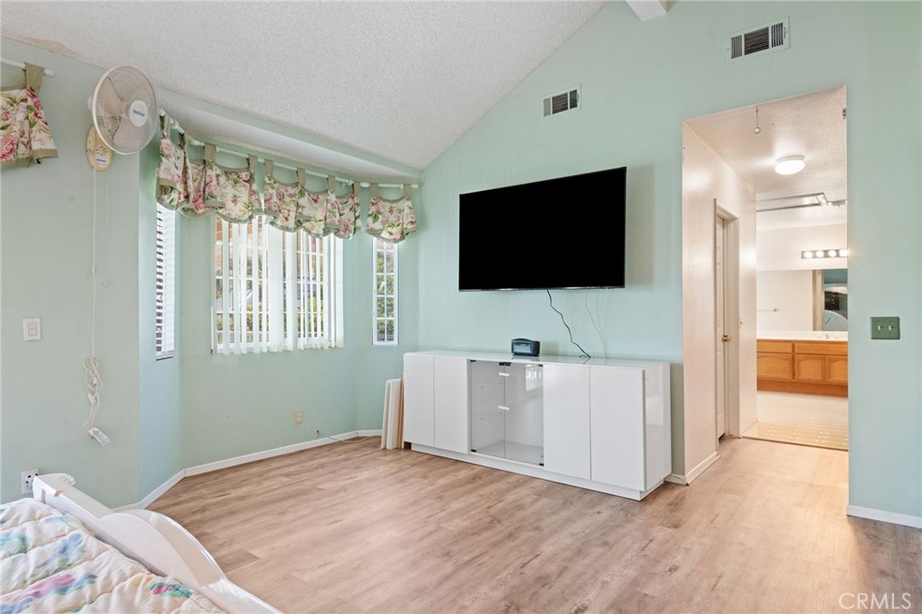 3047 Prado Lane Colton, CA 92324 - Photo 21 of 51 a view of a livingroom with furniture and a flat screen tv