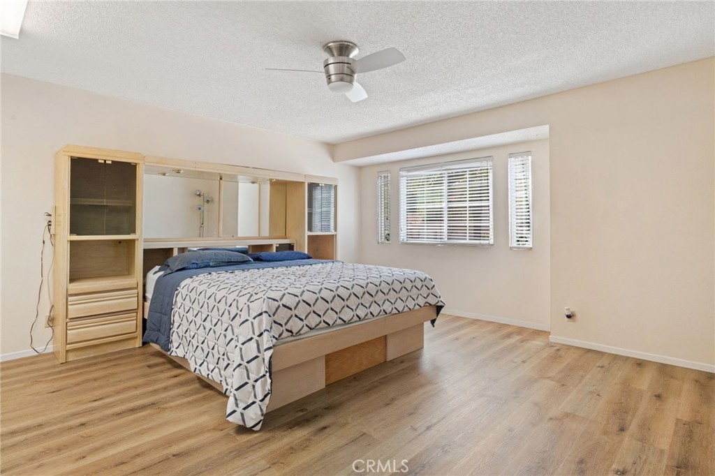 3047 Prado Lane Colton, CA 92324 - Photo 25 of 51 a bedroom with a bed and window