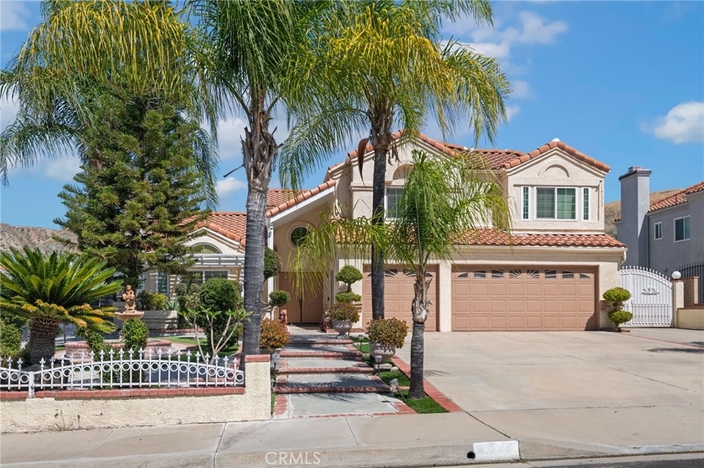 3047 Prado Lane Colton, CA 92324 - Photo 3 of 51 a front view of a house with a garden
