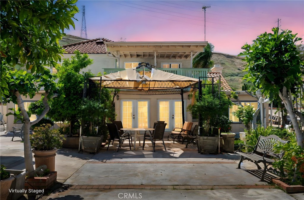 3047 Prado Lane Colton, CA 92324 - Photo 48 of 51 a view of a building with sitting area and garden