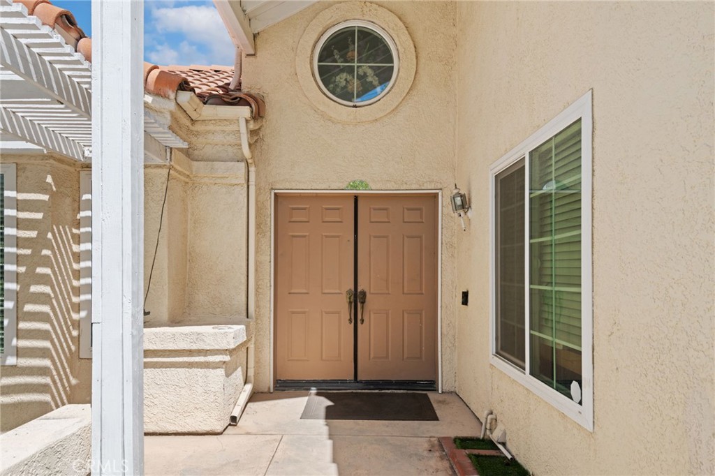 3047 Prado Lane Colton, CA 92324 - Photo 6 of 51 a view of entryway with wooden floor and a carpet