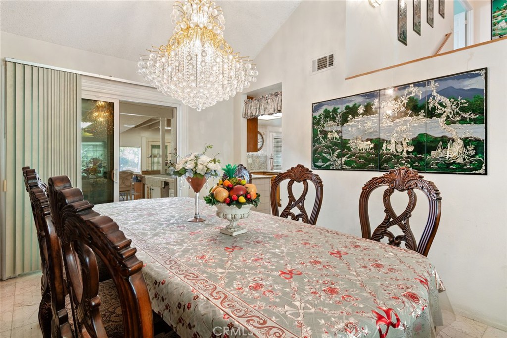 3047 Prado Lane Colton, CA 92324 - Photo 10 of 51 a view of a dining room with furniture window and outside view