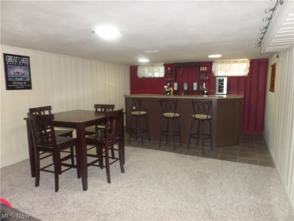1566 Felton Road South Euclid, OH 44121 - Photo 14 of 21 A view of the built in bar in the rec room/man cave.