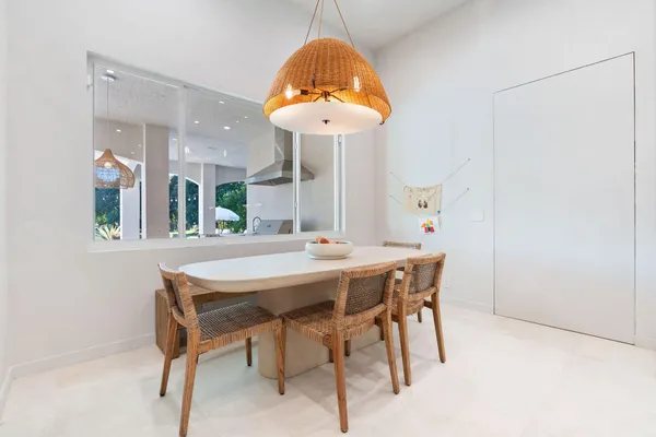 a bathroom with a sink vanity and mirror