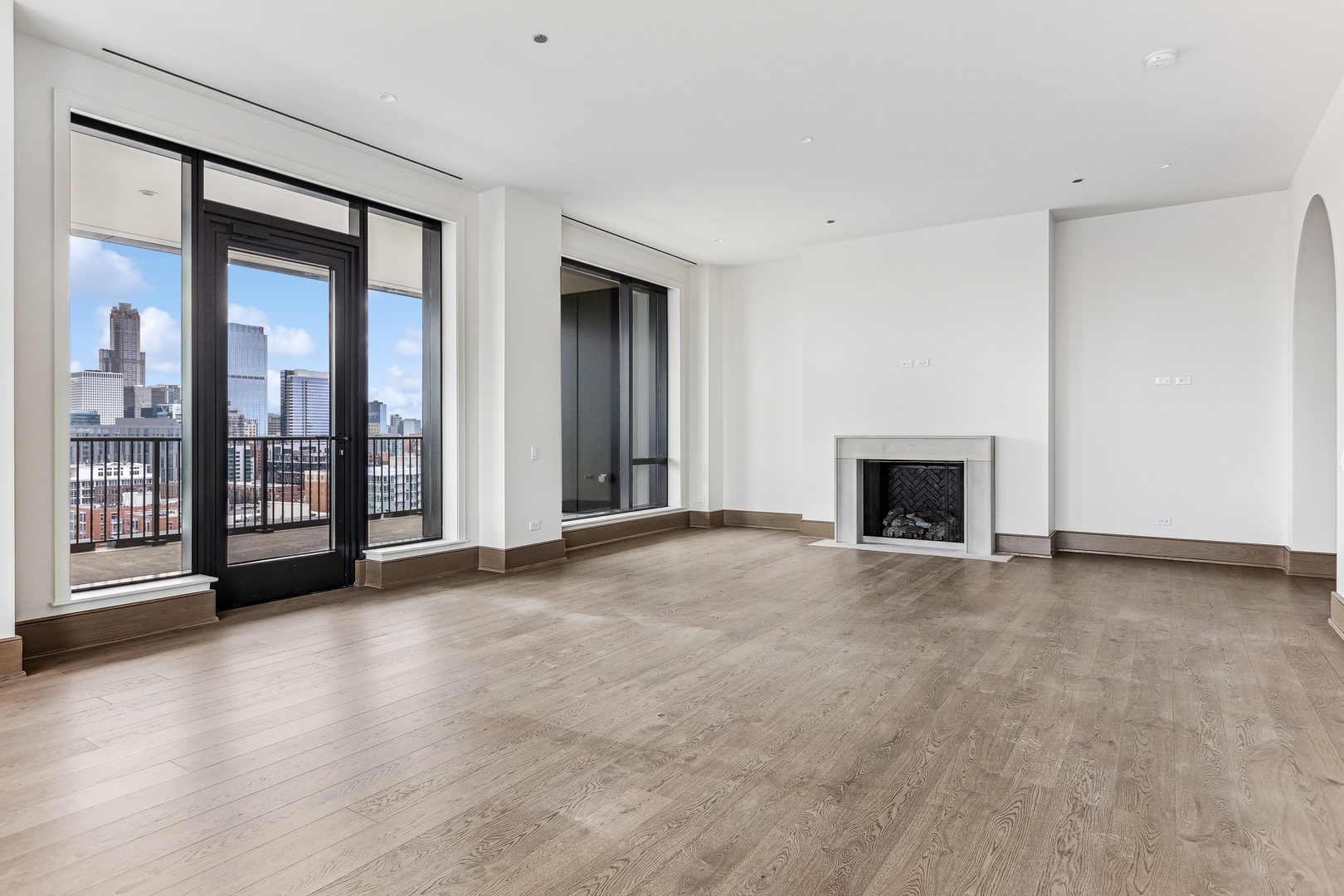 21 North May Street, Unit 1402 Chicago, IL 60607 - Photo 12 of 49 a view of an empty room with glass door and balcony