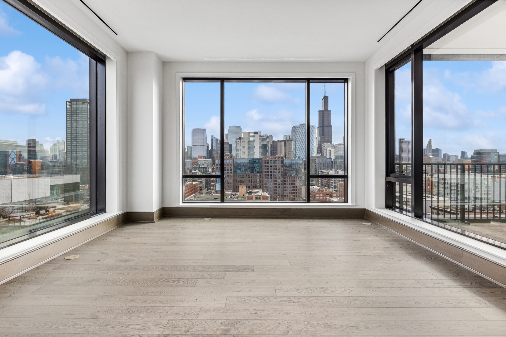 21 North May Street, Unit 1402 Chicago, IL 60607 - Photo 14 of 49 a view of an empty room with windows
