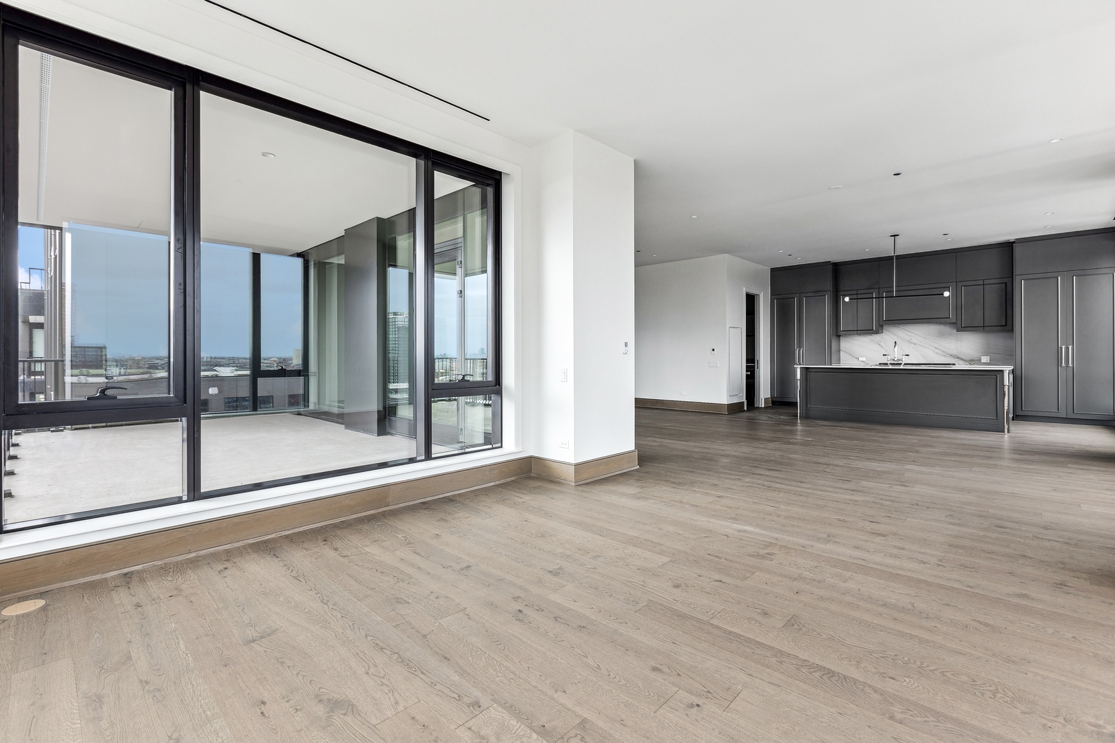 21 North May Street, Unit 1402 Chicago, IL 60607 - Photo 16 of 49 a view of an empty room with glass door