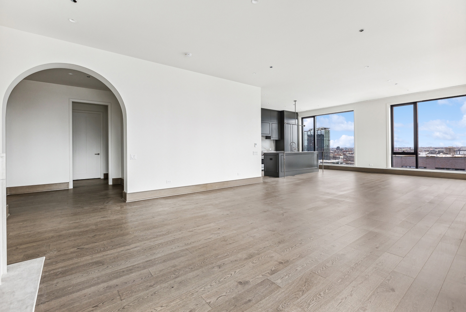 21 North May Street, Unit 1402 Chicago, IL 60607 - Photo 18 of 49 a view of a livingroom with wooden floor