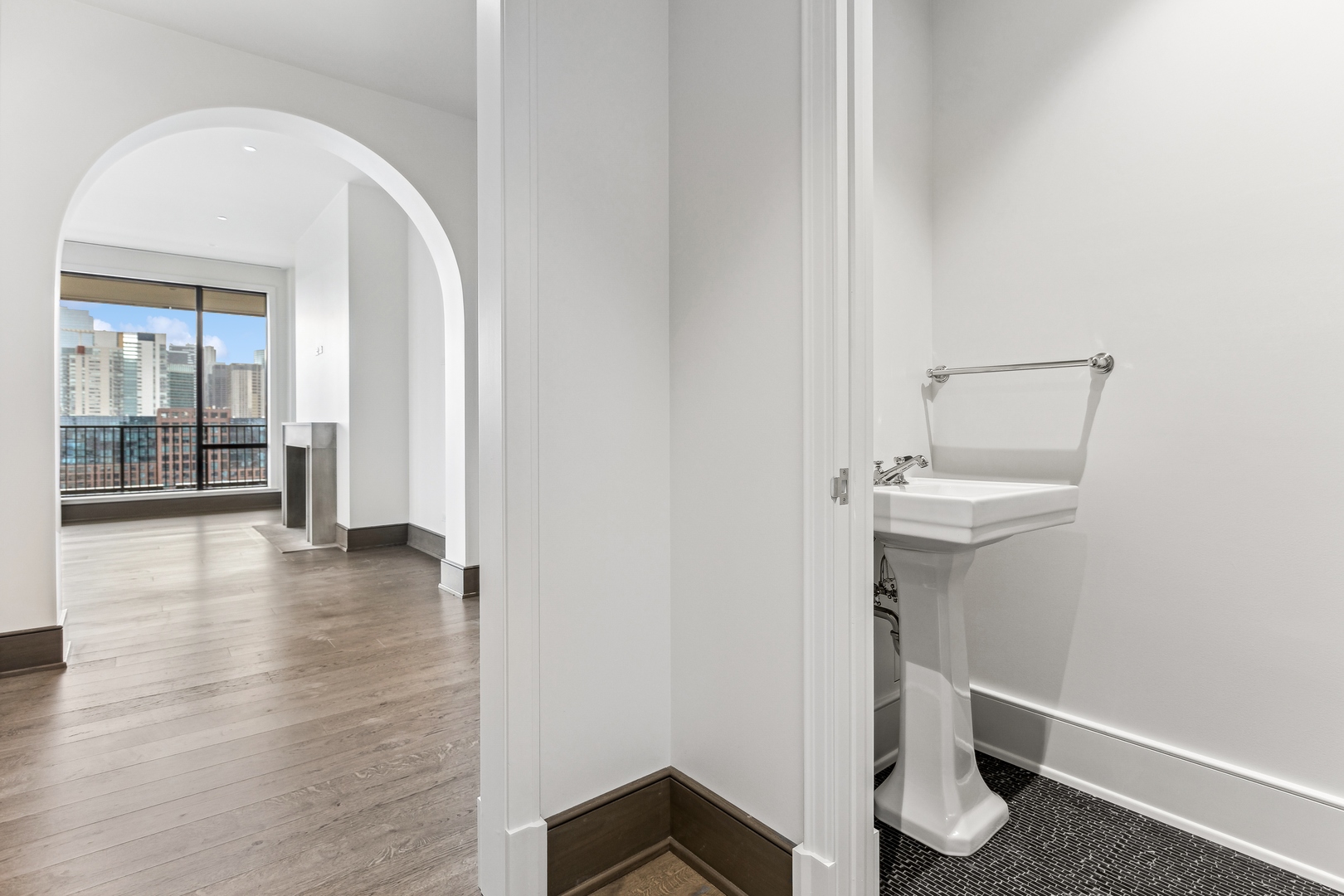 21 North May Street, Unit 1402 Chicago, IL 60607 - Photo 27 of 49 wooden floor in an empty room