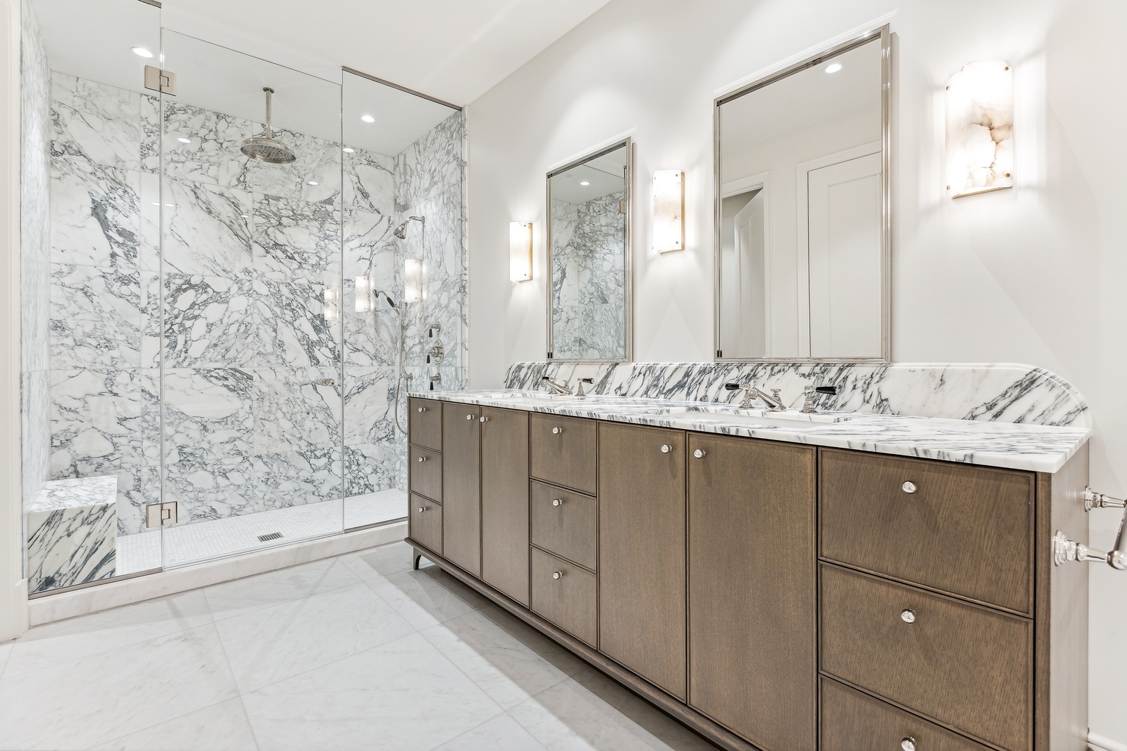 21 North May Street, Unit 1402 Chicago, IL 60607 - Photo 33 of 49 a bathroom with a sink mirror and a shower