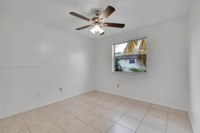 a view of an empty room with window