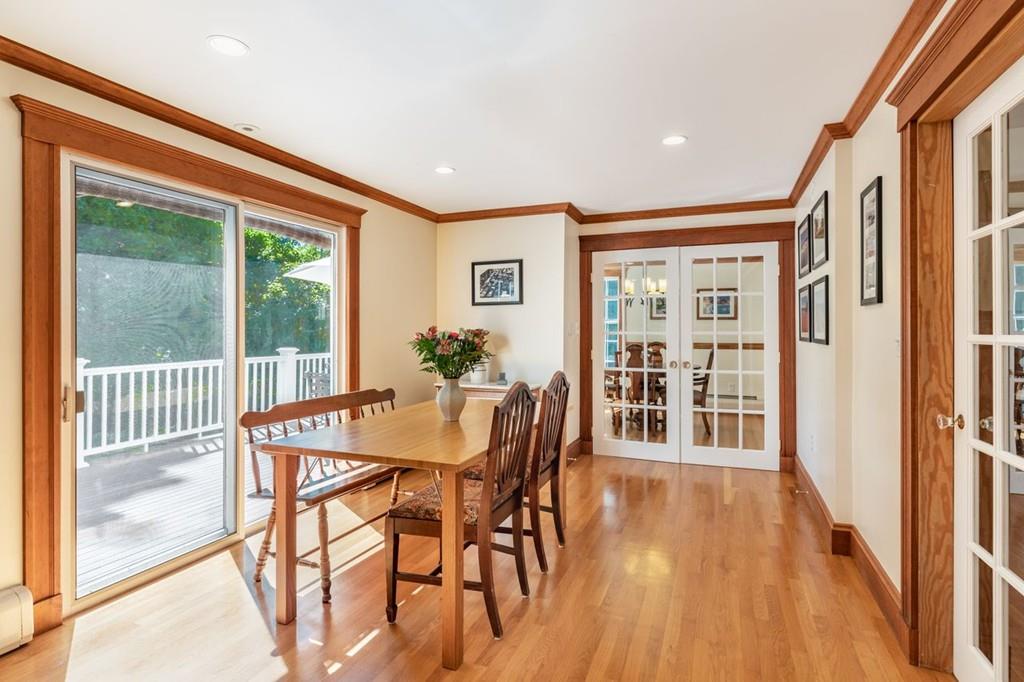 2 Highland Avenue Lexington, MA 02421 - Photo 13 of 32 a dining room with furniture and wooden floor