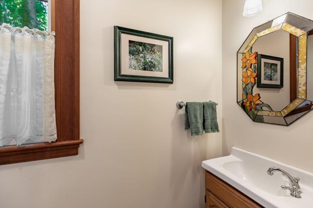 2 Highland Avenue Lexington, MA 02421 - Photo 17 of 32 a bathroom with a sink and a mirror