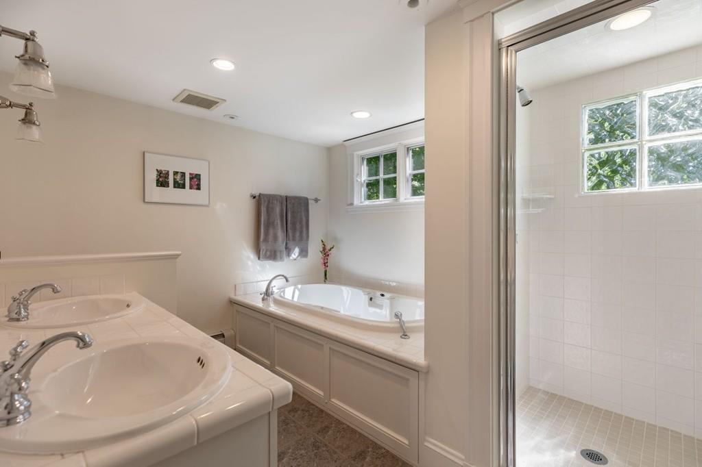 2 Highland Avenue Lexington, MA 02421 - Photo 19 of 32 a bathroom with a sink and a window