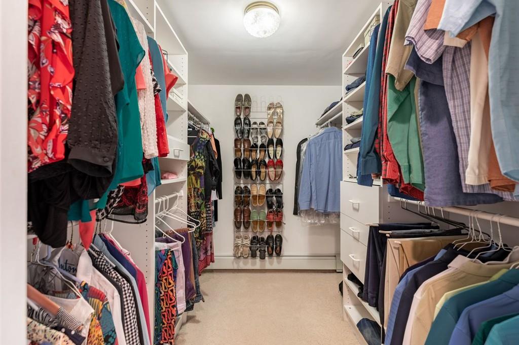 2 Highland Avenue Lexington, MA 02421 - Photo 20 of 32 a view of walk in closet with clothes and shoes