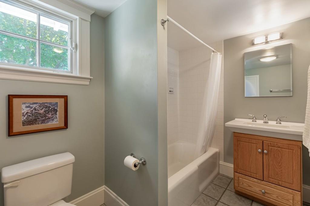 2 Highland Avenue Lexington, MA 02421 - Photo 21 of 32 a bathroom with a toilet sink and mirror