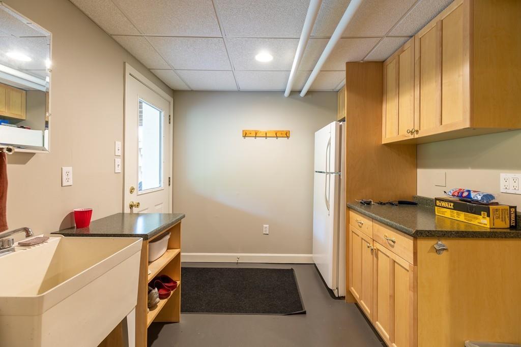 2 Highland Avenue Lexington, MA 02421 - Photo 27 of 32 a kitchen that has a cabinets and a stove