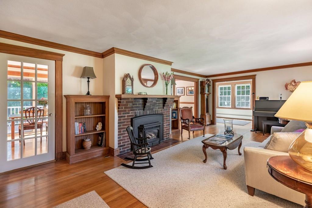 2 Highland Avenue Lexington, MA 02421 - Photo 4 of 32 a living room with furniture and a fireplace