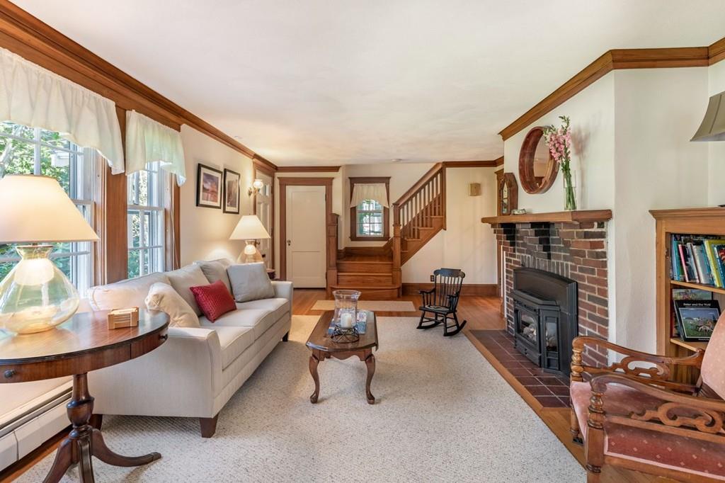 2 Highland Avenue Lexington, MA 02421 - Photo 6 of 32 a living room with furniture and a fireplace