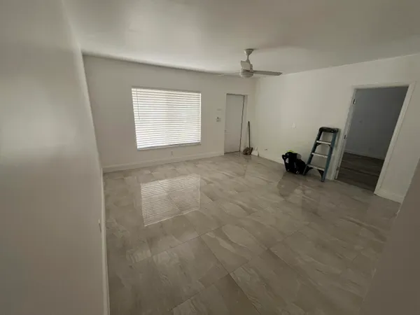 an entryway with a workspace