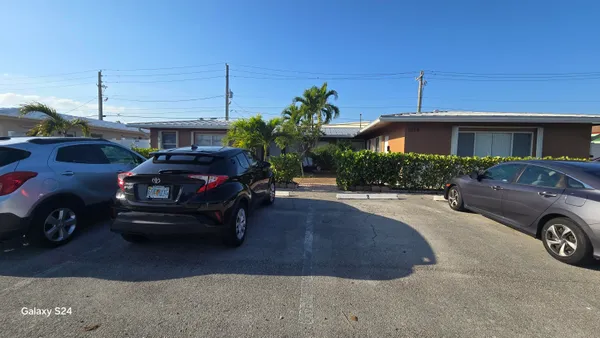 a car parked in front of a house