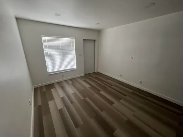 a kitchen with a refrigerator sink and microwave