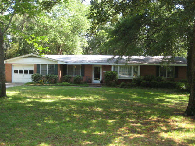 1306 Evans Road Aiken, SC 29803 - Photo 1 of 1 a front view of a house with a garden