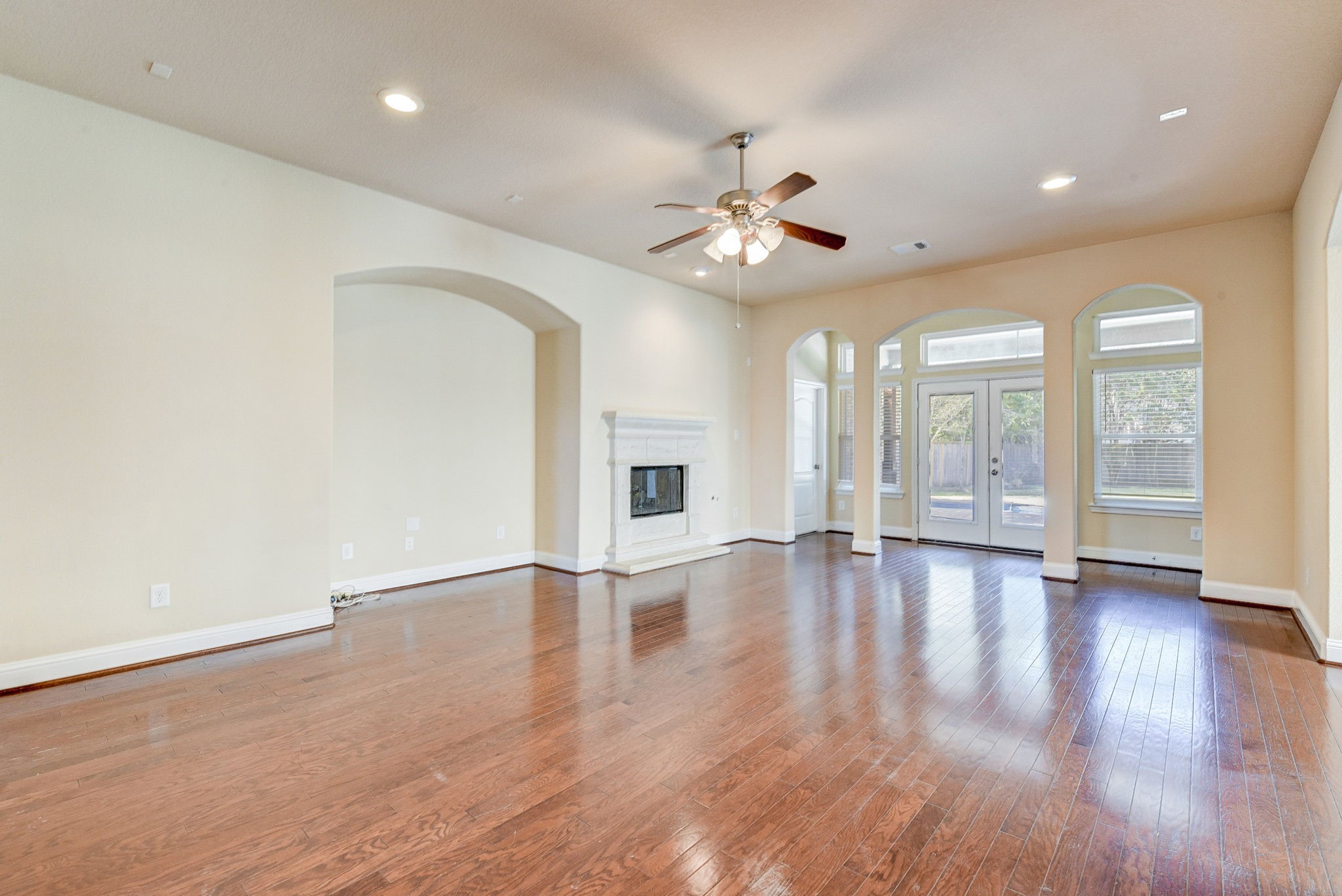 39 South Pinto Point Circle Spring, TX 77389 - Photo 12 of 48 wooden floor in an empty room with a window