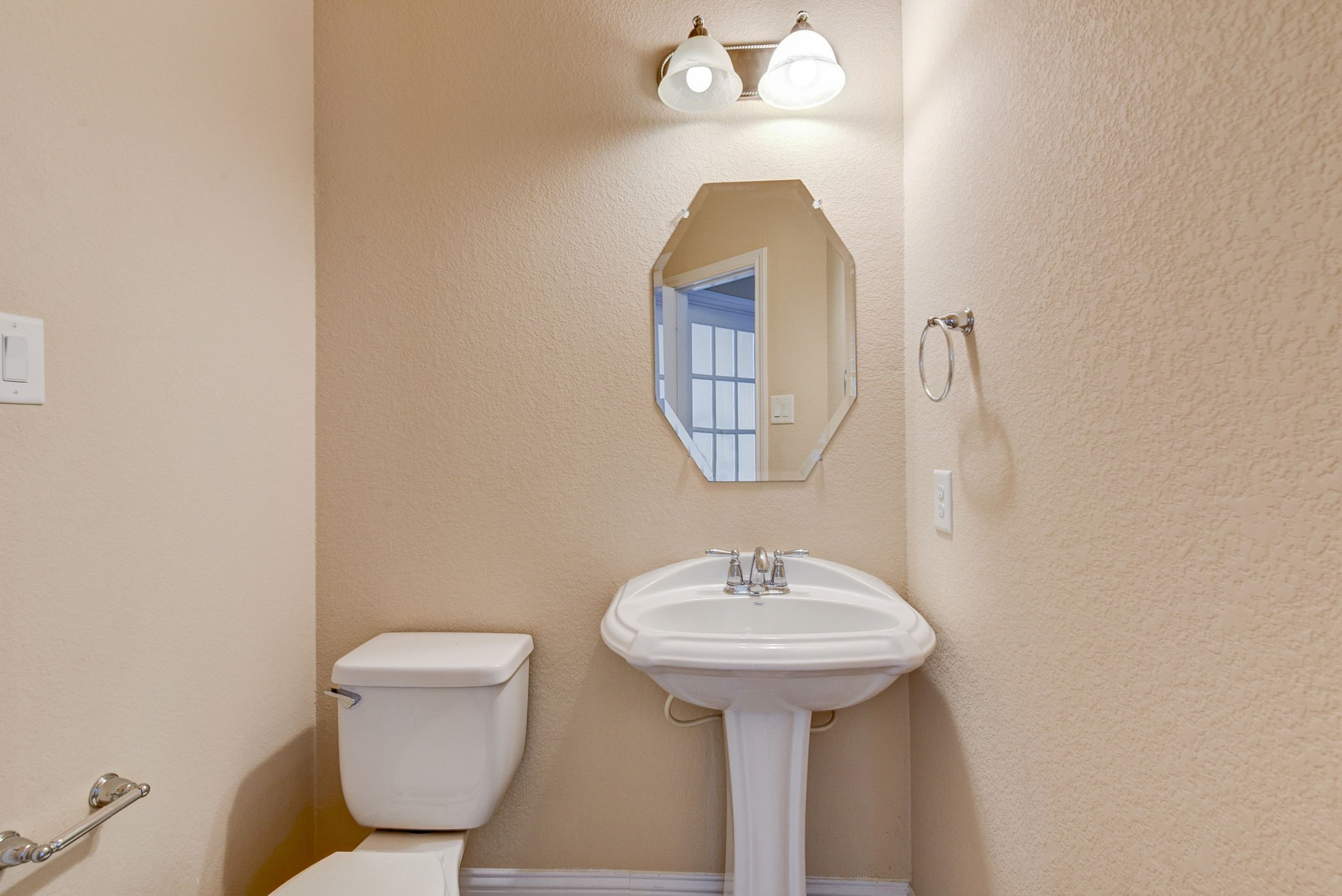 39 South Pinto Point Circle Spring, TX 77389 - Photo 21 of 48 a bathroom with a toilet sink and mirror